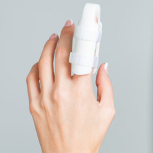 Férula dedil con correa blanca